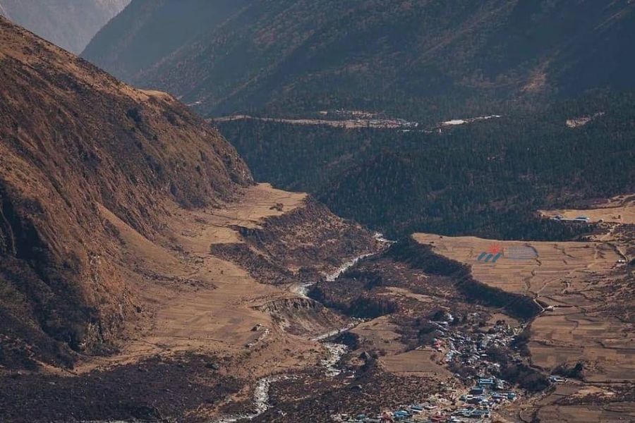 Aerial view of Samagaun village nestled in a high-altitude valley with terraced fields